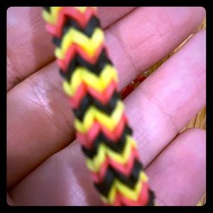 Black yellow and red bracelet